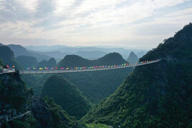 1-Day Tour:Yangshuo Yulong Bamboo Boat and Ruyi Peak Cable Car from Guilin Hotel - Authentic Experiences and Unique Features