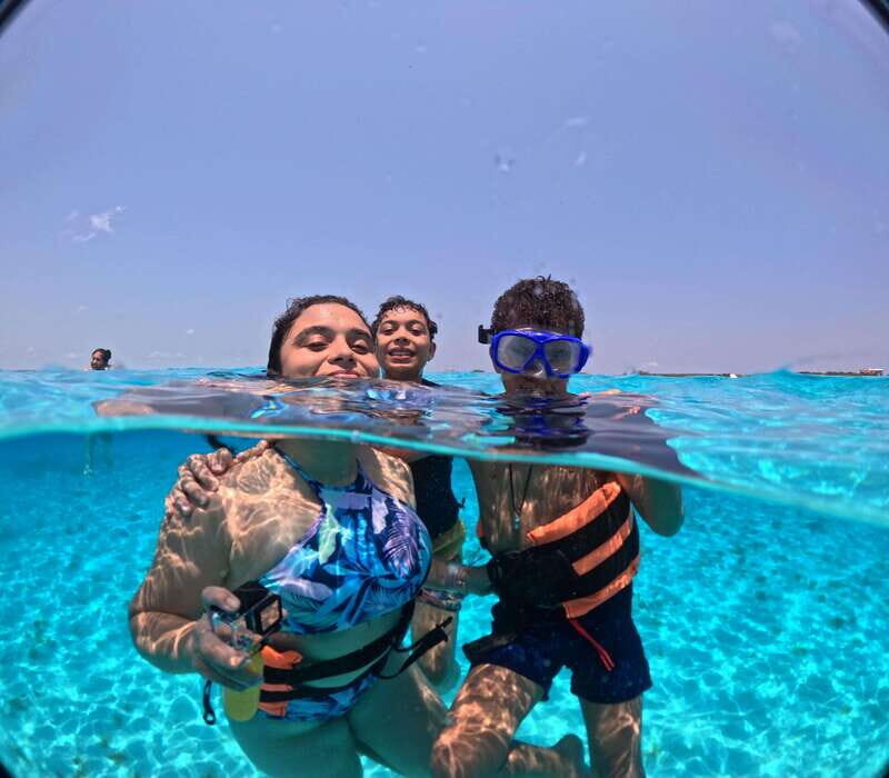 #1 Private Catamaran to Isla Mujeres: Snorkeling & Open Bar! - Key Points