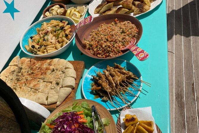 4-hour-snorkel-cruise-to-underwater-sculptures-with-boat-dogs