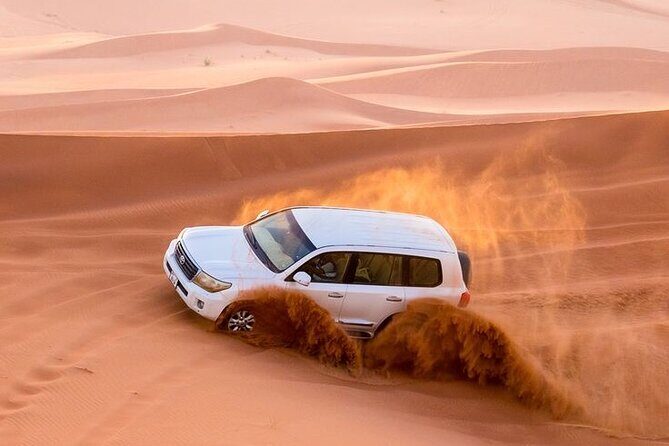 4hr Desert Safari: Sunset,Sunrise,Camel,Sand boarding,Inland Sea - Key Points