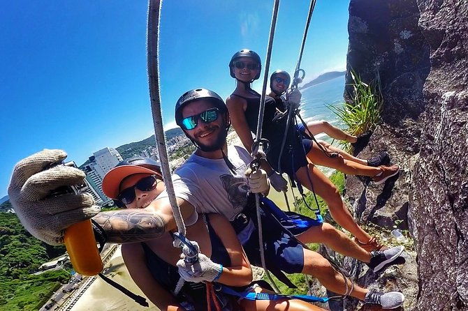 abseiling-47-meters-with-instructor-facing-the-sea