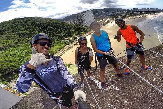 abseiling-47-meters-with-instructor-facing-the-sea