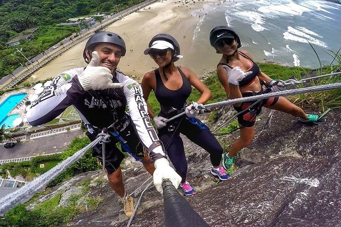 abseiling-47-meters-with-instructor-facing-the-sea