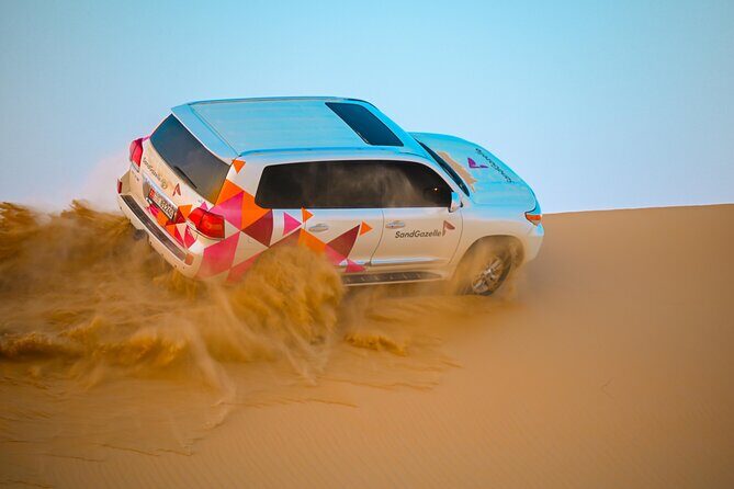 Abu Dhabi Evening Desert Safari - Private car Dune bashing & BBQ - Desert Camp: Culture, Cuisine, and Entertainment
