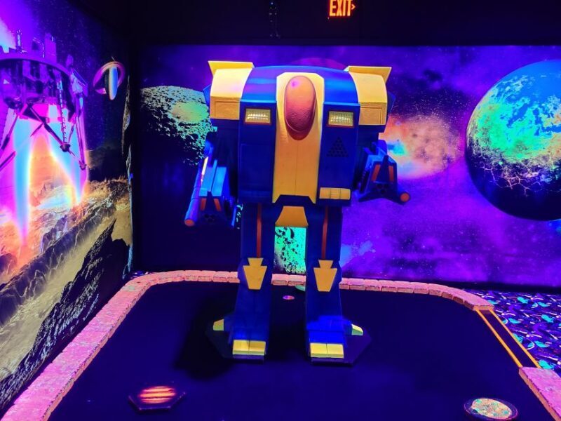 American Dream: Blacklight Mini Golf Entry Ticket - Key Points