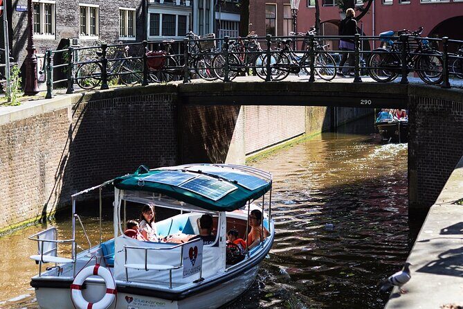 Amsterdam 90-min Private Canal Cruise with Live Guide and Drinks - Authentic experiences and reviewer insights
