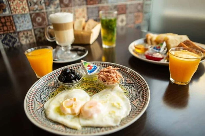 Amsterdam: Breakfast & True Amsterdam Experience Tour - Exploring the Itinerary: What to Expect
