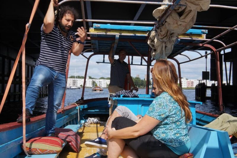 amsterdam-canal-cruise-on-a-wooden-refugee-boat
