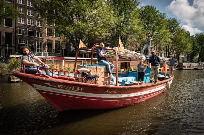 amsterdam-canal-cruise-on-a-wooden-refugee-boat