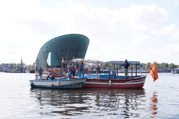 amsterdam-canal-cruise-on-a-wooden-refugee-boat