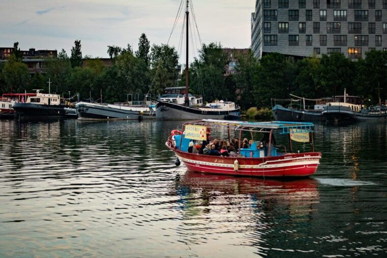 amsterdam-canal-cruise-on-a-wooden-refugee-boat