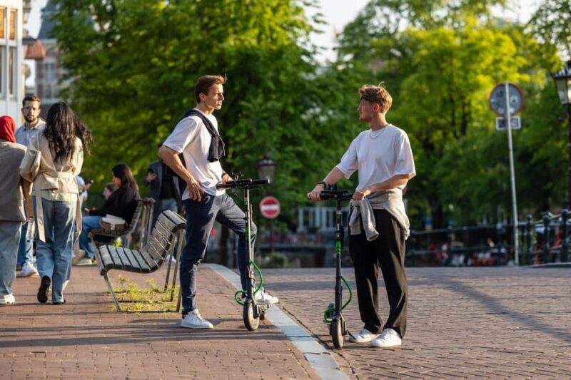 Amsterdam: E-Scooter Tour Golden Canals Tour (2h) - Who Will Love This Tour?