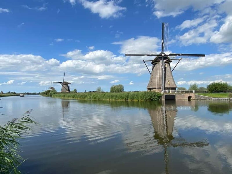 Amsterdam: Kinderdijk, Euromast, Delft and Den Haag Day Tour - Delft: Medieval Charm and Blue Pottery