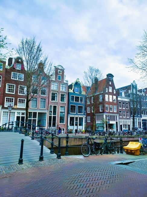 Amsterdam: Off the Beaten Path Bike Tour in French - Authenticity and Value
