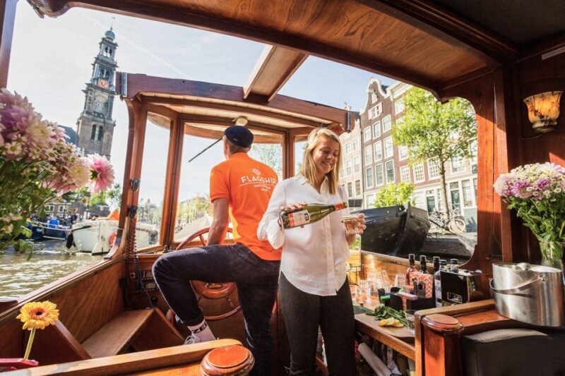 Amsterdam: Open Boat Cruise & Unlimited Drinks & Bite Option - The Guide & Overall Atmosphere
