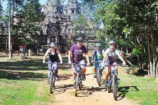Angkor Sunrise Bike Tour with Breakfast & Lunch - Key Points