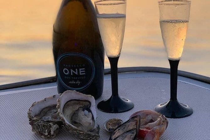 aperitif-on-the-boat-at-sunset-island-and-sea-caves