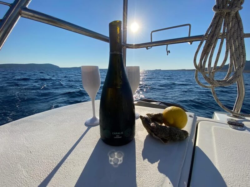 aperitifs at sunset on the Stintino catamaran burianaCharter - An In-Depth Look at the Sunset Catamaran Experience in Stintino