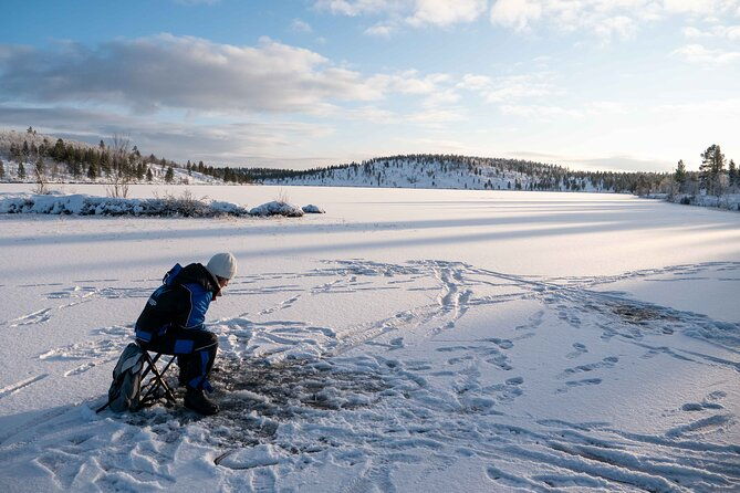 arctic-fishing-open-fire-cooking