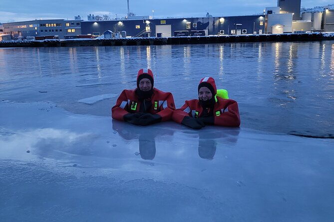 arctic-ice-floating-in-warm-survival-suit-tromso