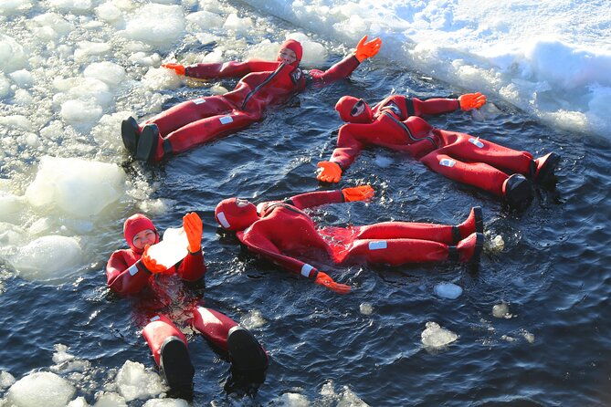 arctic-ice-floating-in-warm-survival-suit-tromso