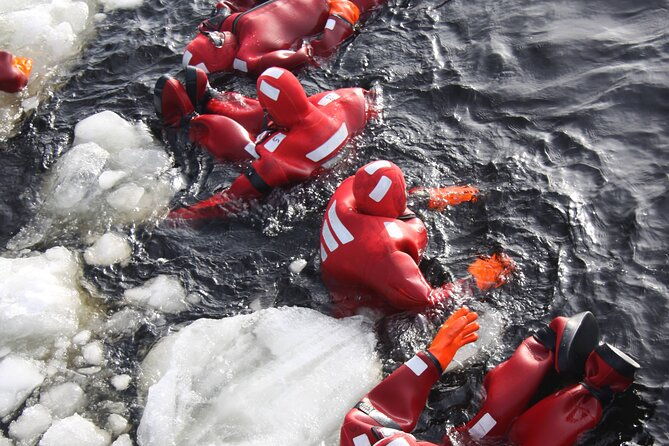 arctic-ice-floating-in-warm-survival-suit-tromso