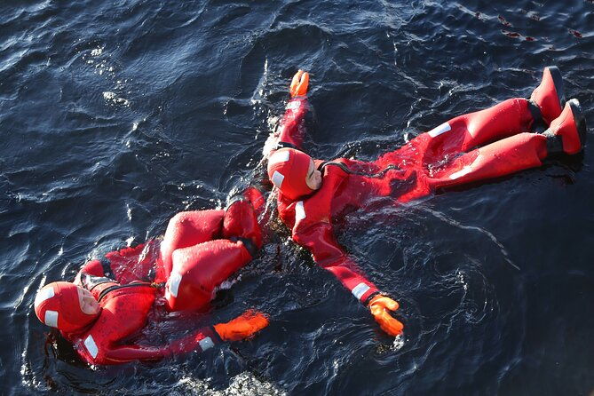 arctic-ice-floating-in-warm-survival-suit-tromso