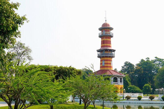 Ayutthaya Summer Palace and Temples Day Tour from Bangkok - The Iconic Buddha Head at Wat Mahathat
