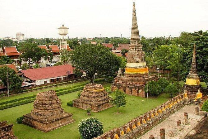 Ayutthaya Sunset Boat Ride & Famous Attractions Tour - Bangkok - Exploring Wat Mahathat