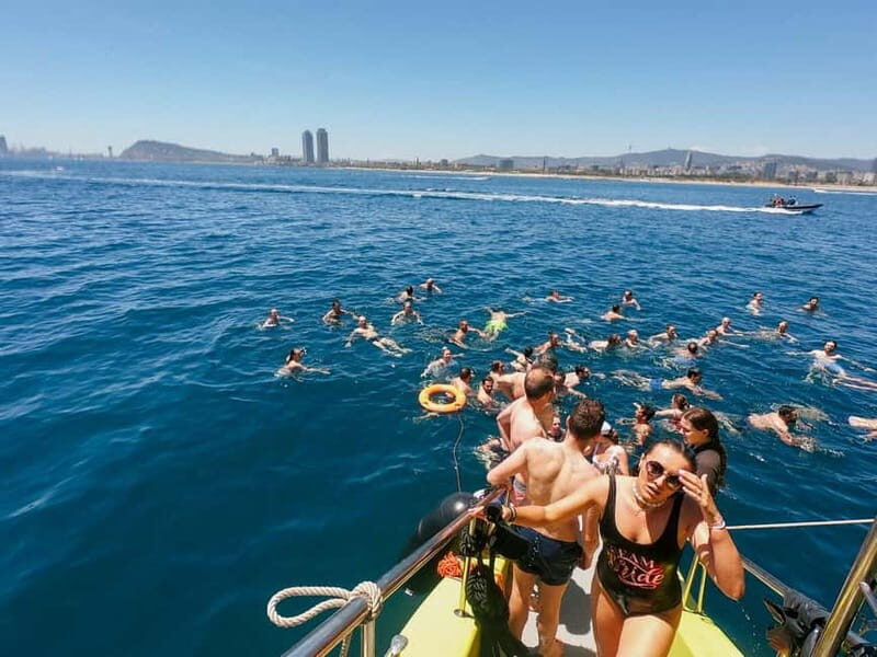 Barcelona: Charcuterie, Swim & Party Boat - Key Points