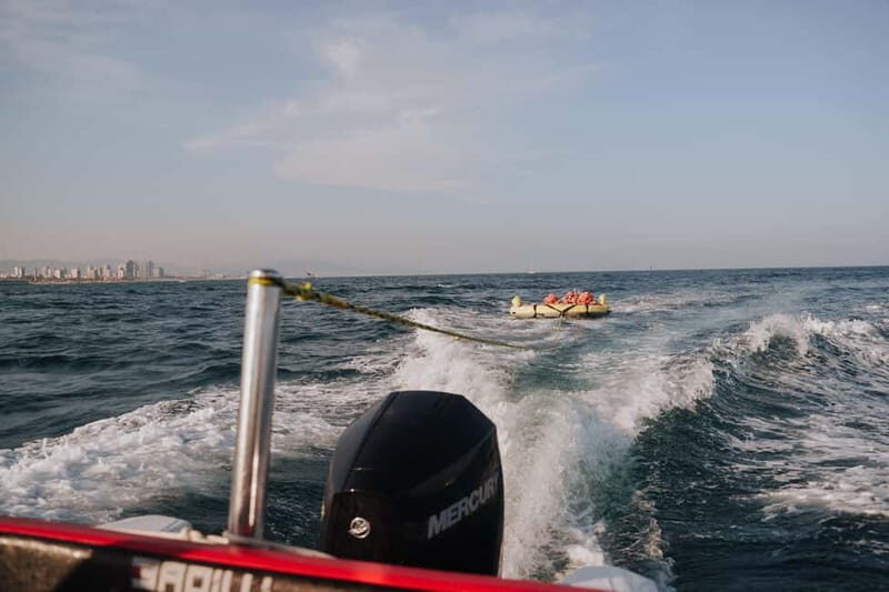 Barcelona: Inflatable Water Tube Ride at Port Olímpic - Key Points