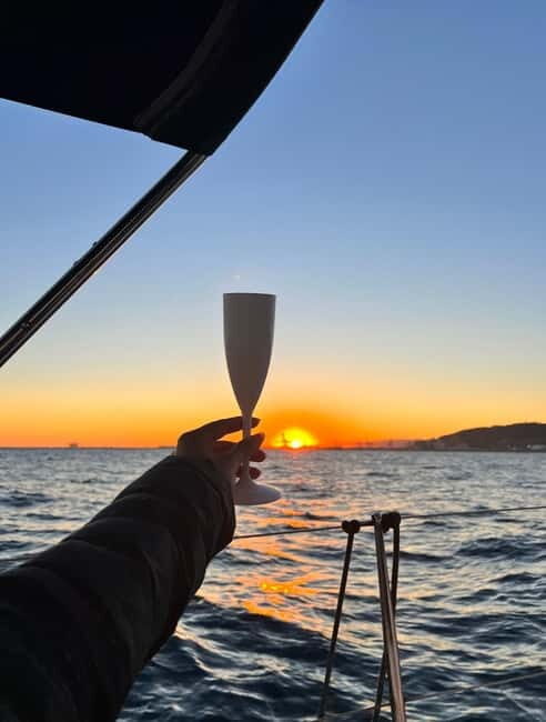 Barcelona: Sunset Sailboat Cruise with Open Bar and Snacks - A detailed look at the experience