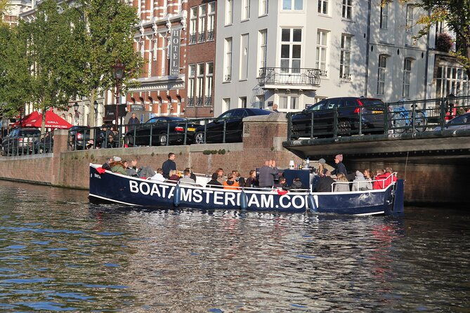 beautiful-open-boat-canal-cruise-in-amsterdam-open-bar-included