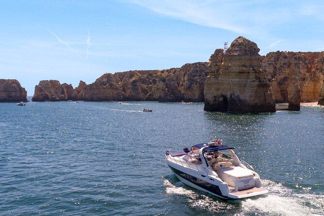 benagil-private-yacht-from-lagos-with-drinks-tapas-paddle-boards-and-kayak