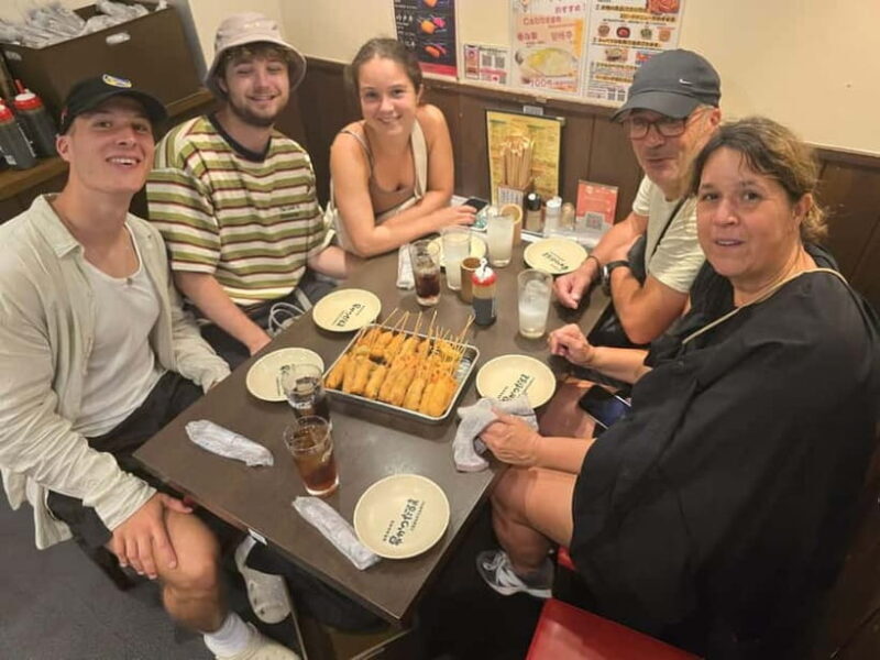 Bite into Shinsekai Discover Osakas Soul Through Every Dish - The Atmosphere: A Neighborhood Frozen in Time