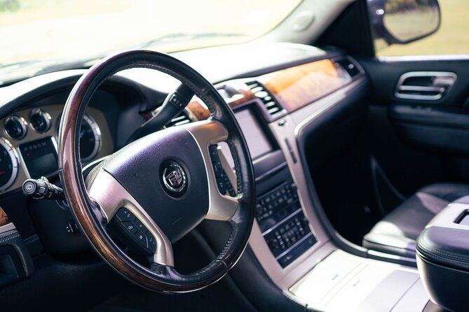 black-cadillac-escalade-suburban-round-trip-airport-transfer-uvf