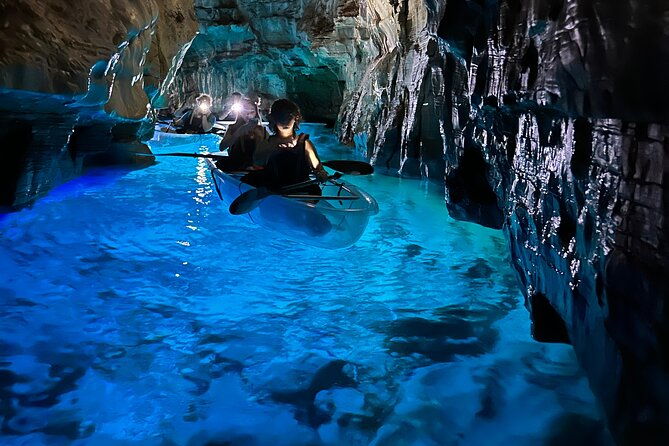 blue-cave-transparent-kayak-night-glow-adventure
