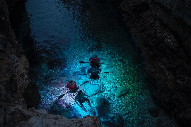 blue-cave-transparent-kayak-night-glow-adventure