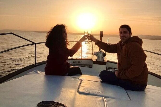 boat-trip-at-sunset-cava-snacks