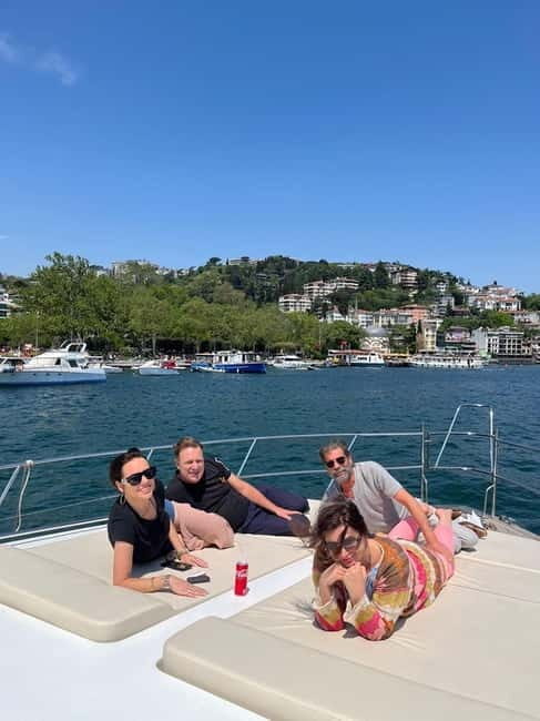 Bosphorus Sunset Yacht Cruise with Guide & Snacks - The Experience: Sailing Through Istanbul’s Iconic Landmarks