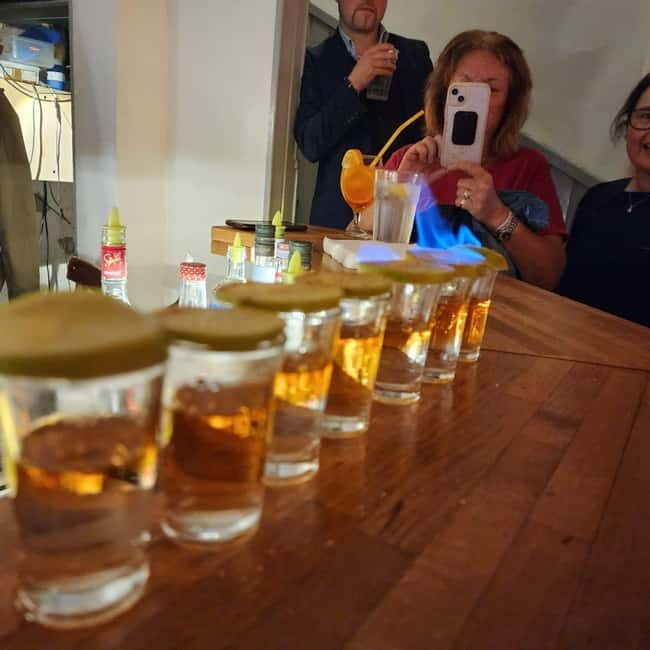 Budapest: Jewish District Night Walking Tour with Drinks - Key Points