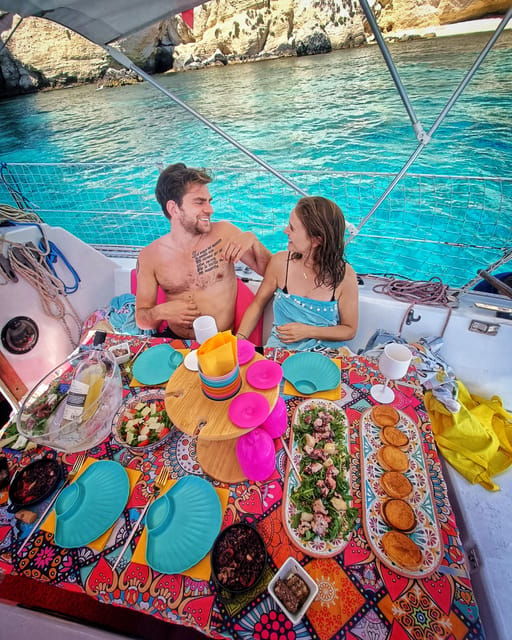 cagliari-relax-on-sailing-boat-with-a-rich-traditional-meal