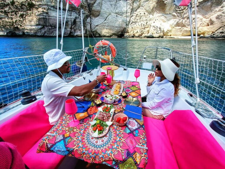 cagliari-relax-on-sailing-boat-with-a-rich-traditional-meal