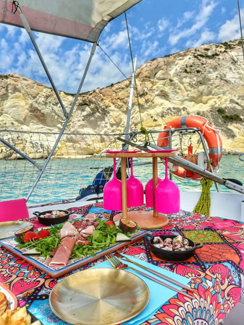 cagliari-relax-on-sailing-boat-with-a-rich-traditional-meal