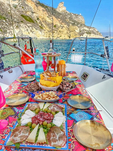 cagliari-relax-on-sailing-boat-with-a-rich-traditional-meal