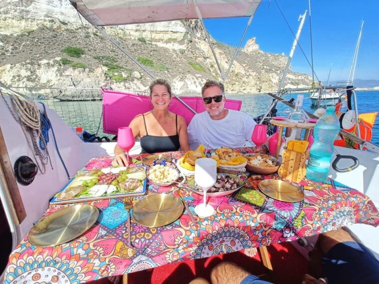 cagliari-relax-on-sailing-boat-with-a-rich-traditional-meal