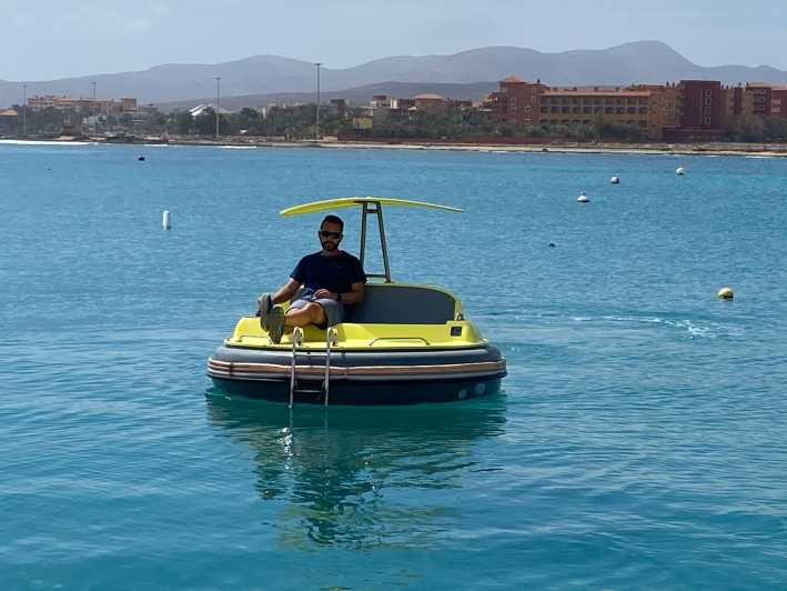 caleta-de-fuste-electric-boat-in-puerto-castillo