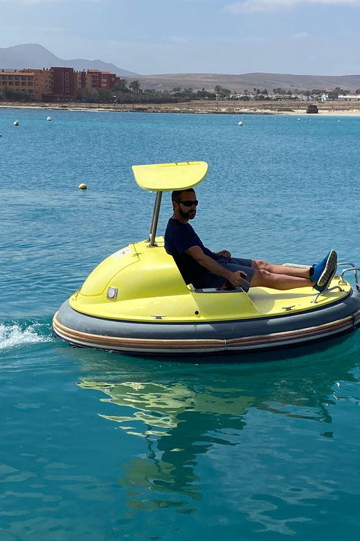 caleta-de-fuste-electric-boat-in-puerto-castillo