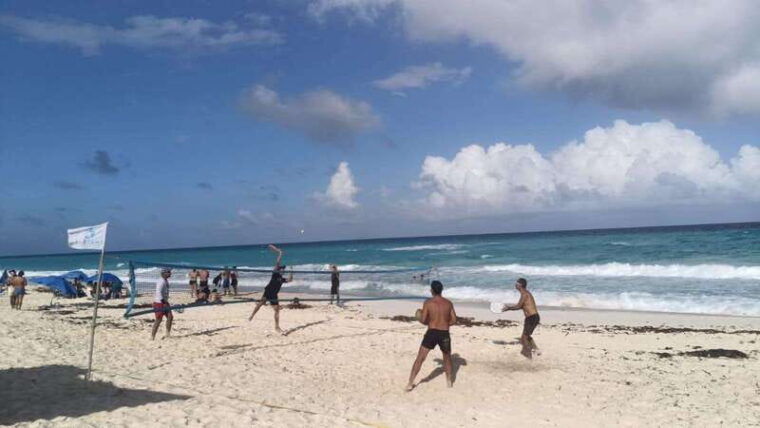 cancun-beach-tennis-game-day-with-local-community