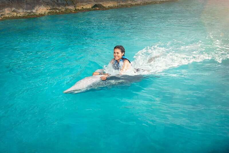 Cancún: Dolphin Swimming Program on Isla Mujeres with Buffet - FAQs